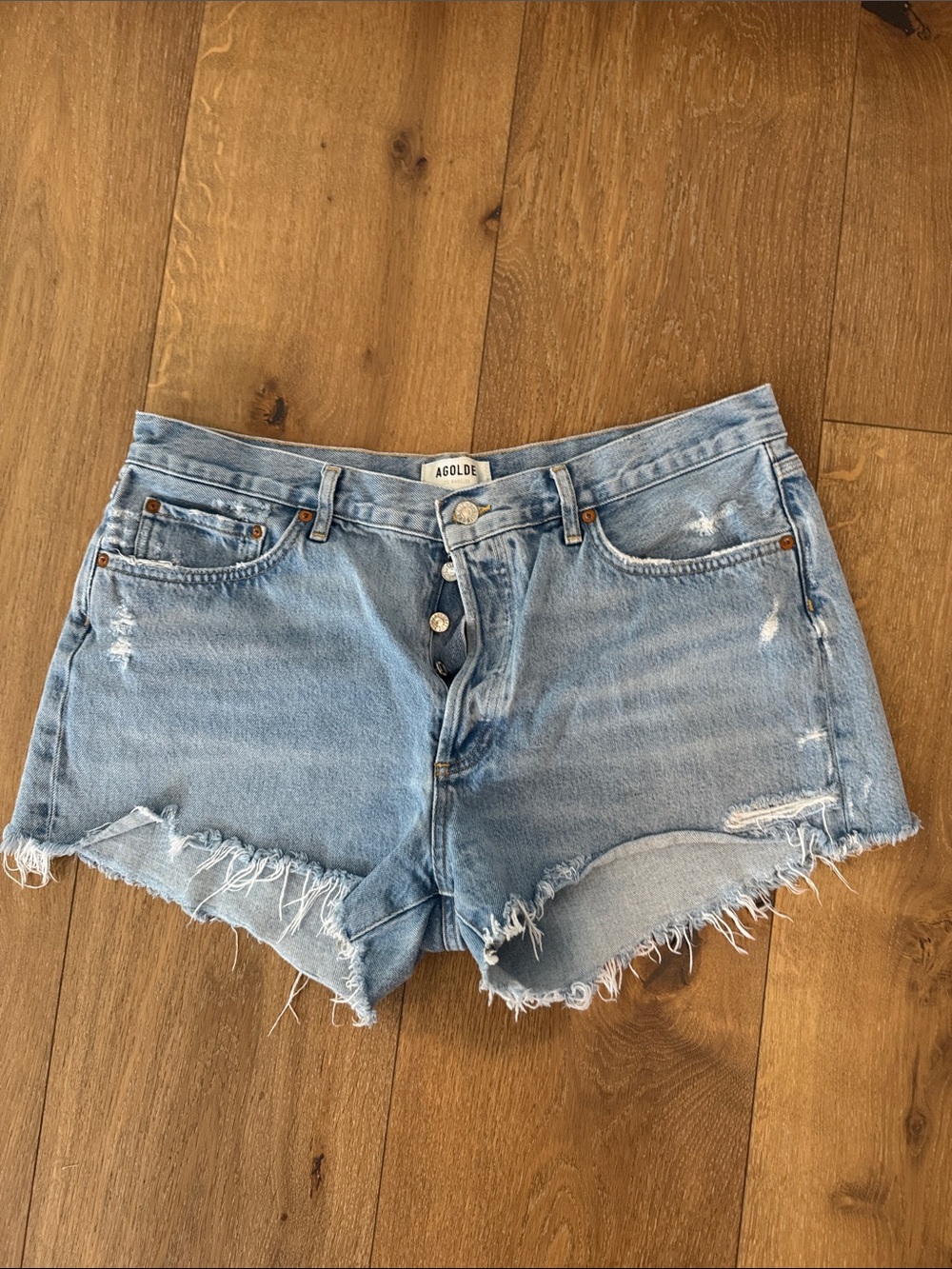 Agolde Light Wash Distressed Denim Cutoff Shorts